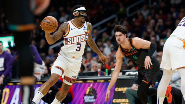 Phoenix Suns guard Bradley Beal (3) drives to the basket past Washington Wizards forward Deni Avdija (8) in the first half at Capital One Arena.
